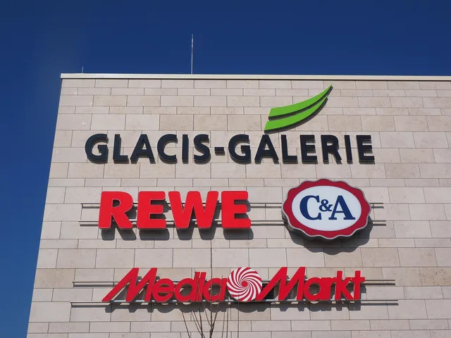 shopping mall, shopping, mall, shopping center, retail stores, service companies, industry sectors, advertising, advertising signs, advertisement, rewe, c a, media market, glacis gallery, new-ulm. A retail media disclosure policy that is reviewed on the rendered placement, not the spec